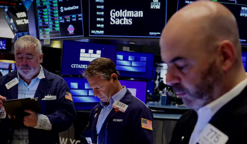 US stocks end higher with boost from Apple | REUTERS