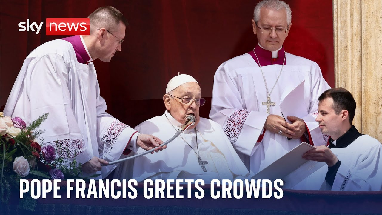 Pope Francis greets crowds at the Vatican