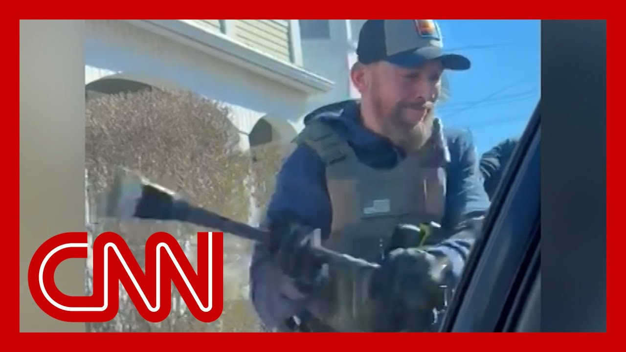 ICE defends agent who smashed car window of undocumented man